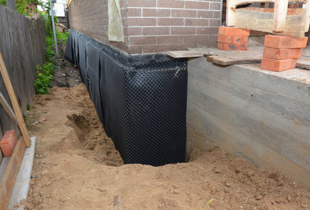 Happy homeowners after waterproofing job in Cross Junction